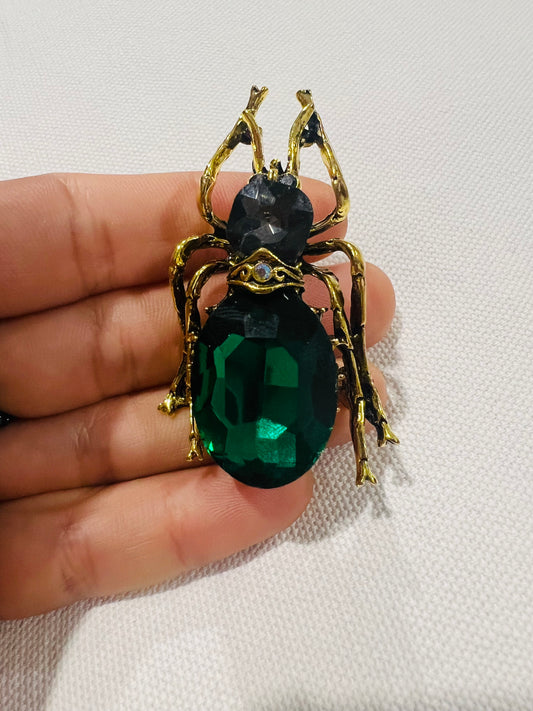 Timid beetle brooch
