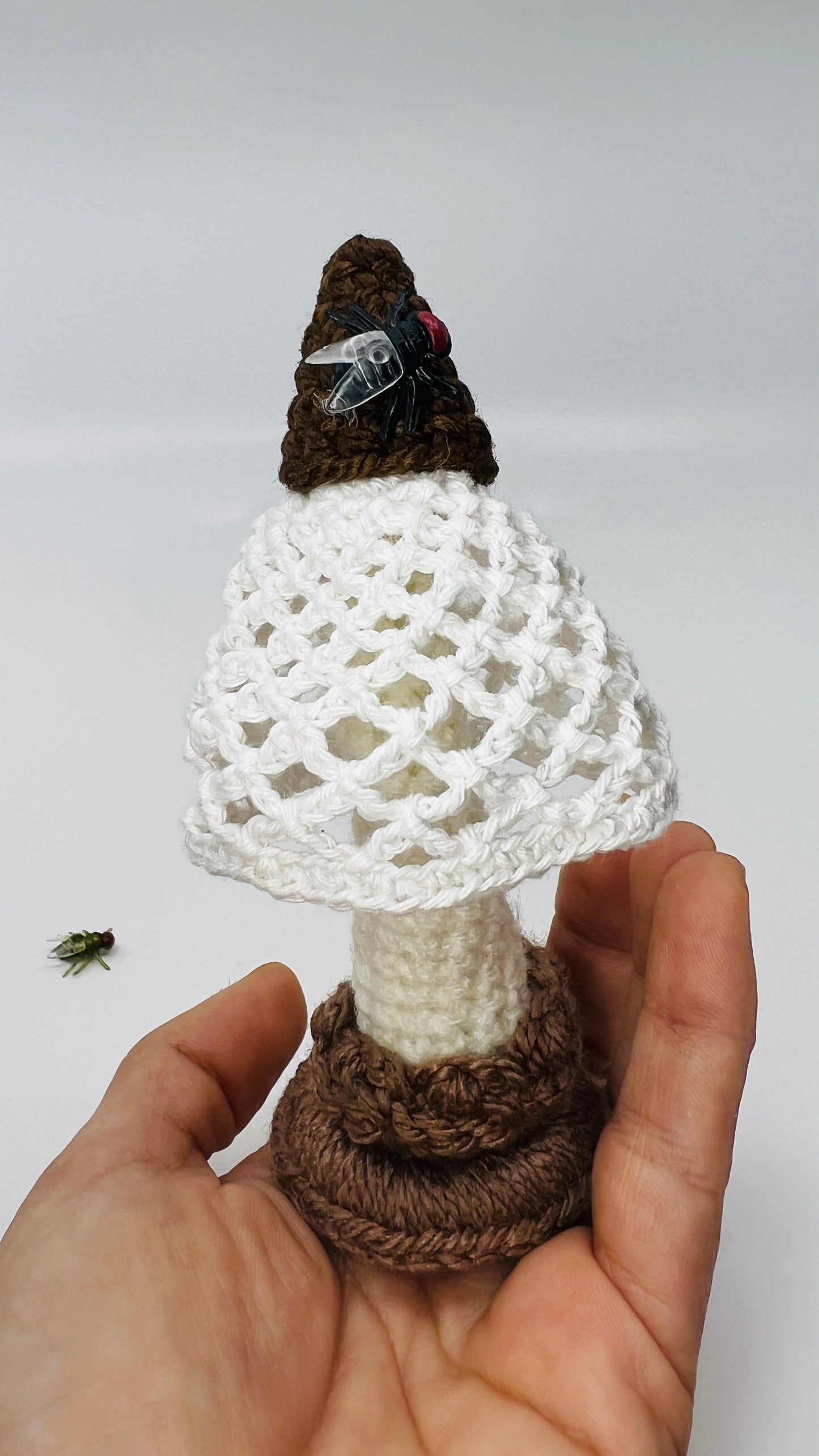 Stinkhorn crochet sculpture