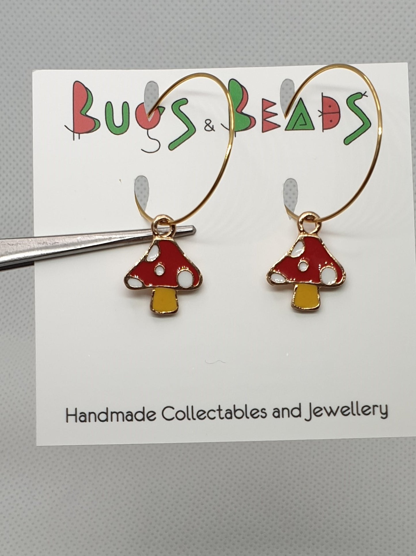 Red mushrooms on loop earrings
