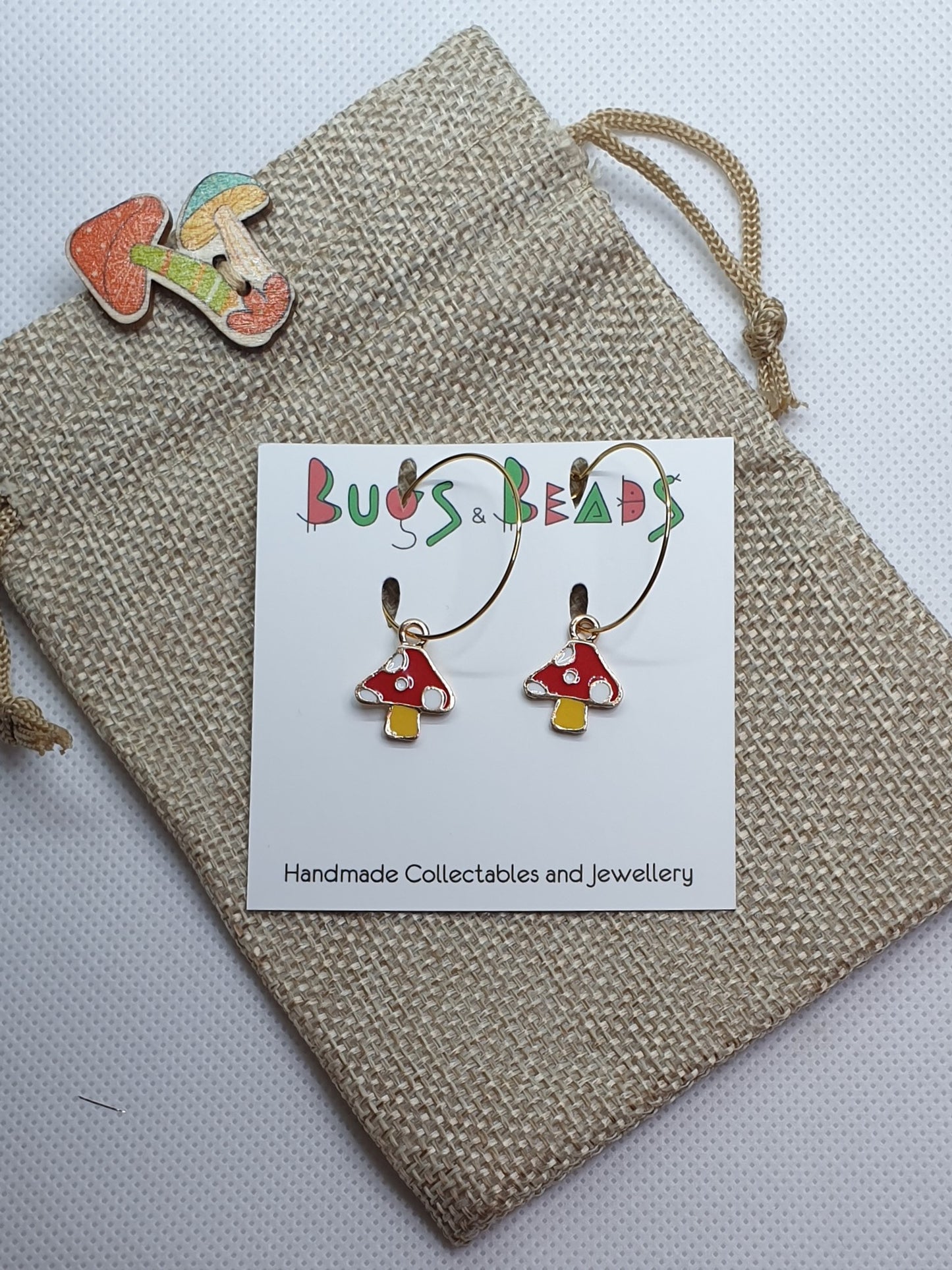 Red mushrooms on loop earrings
