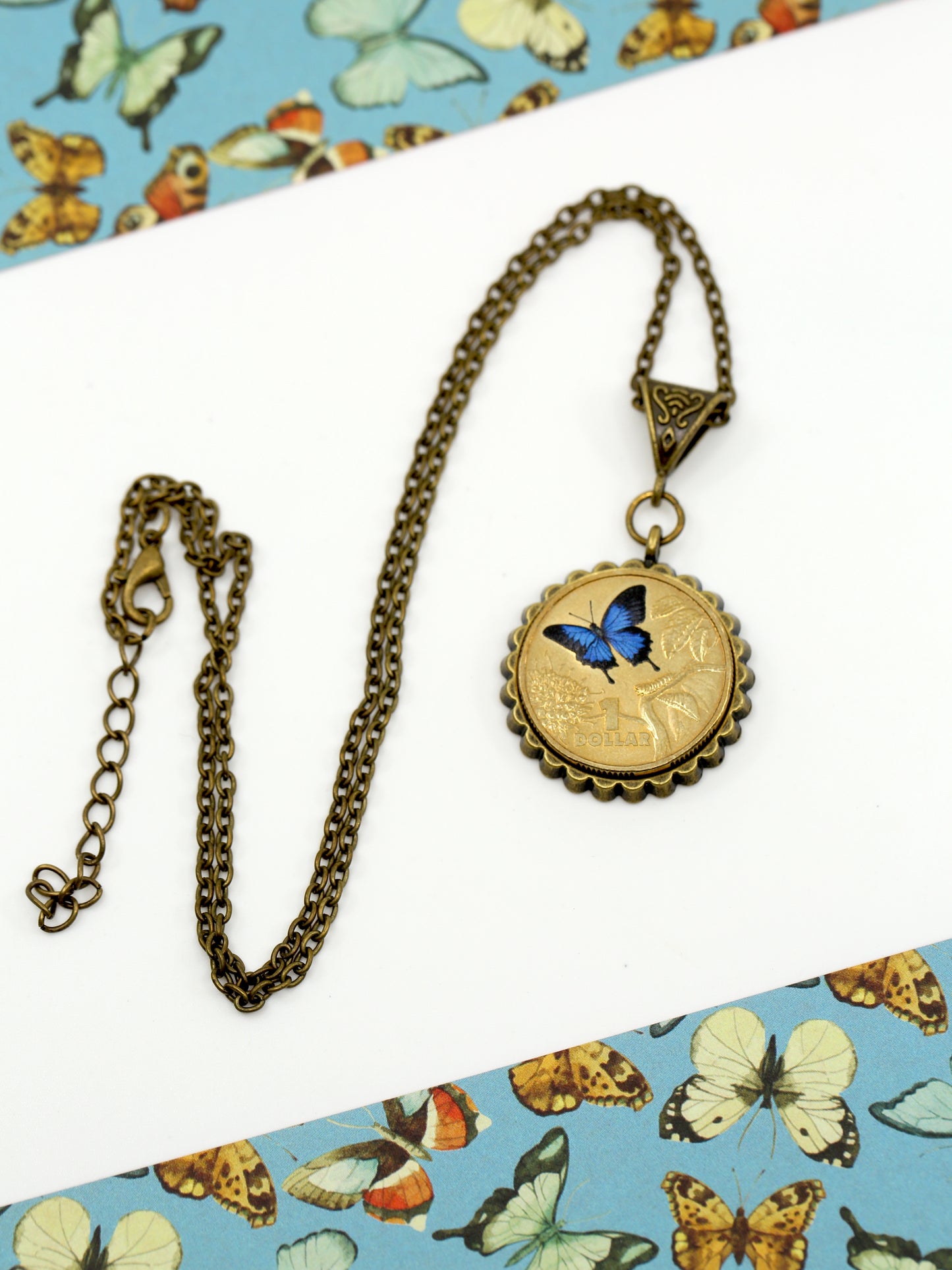 Ulysses butterfly decimal coin necklace