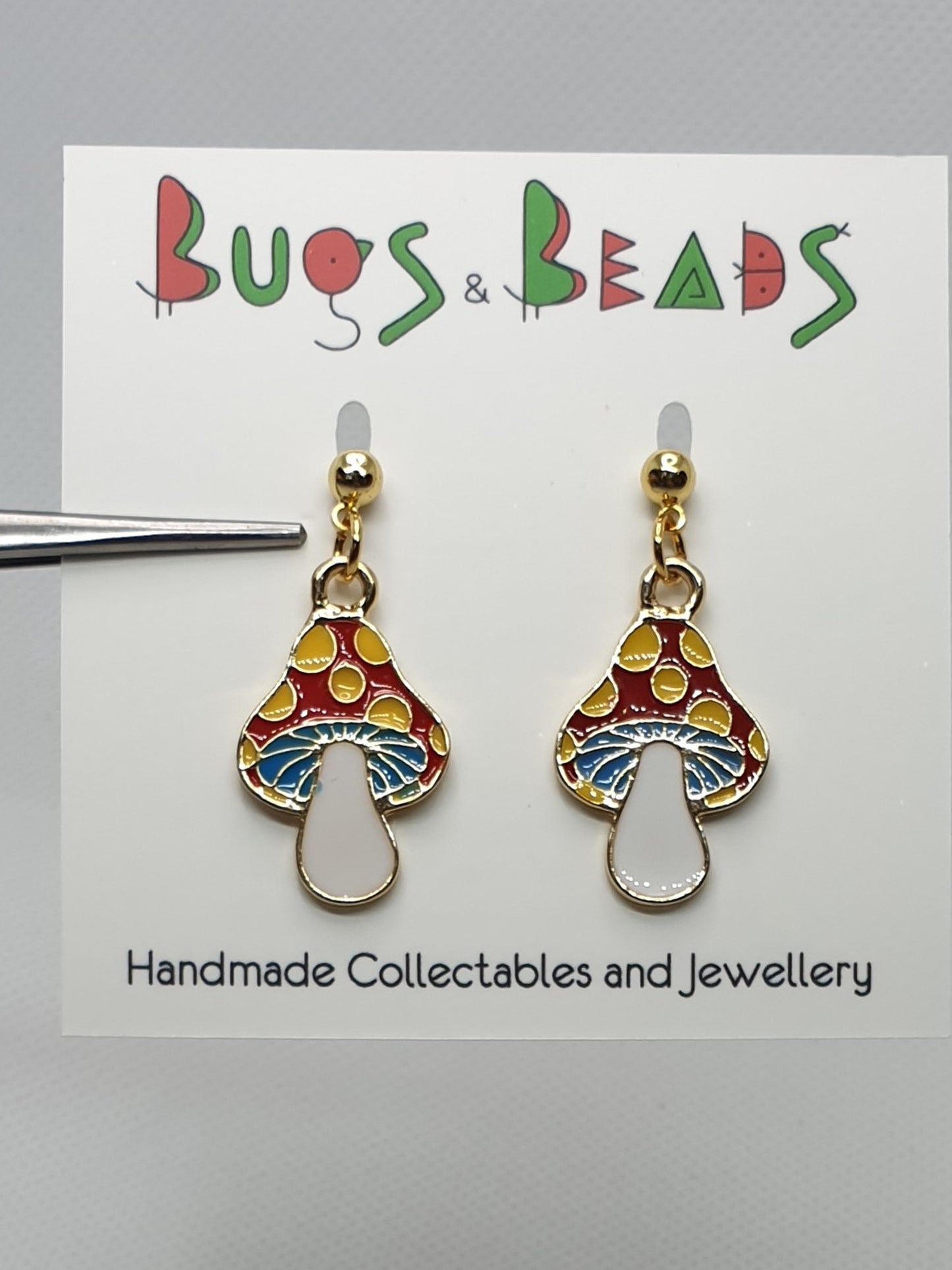 Amanita cartoon golden stud earrings