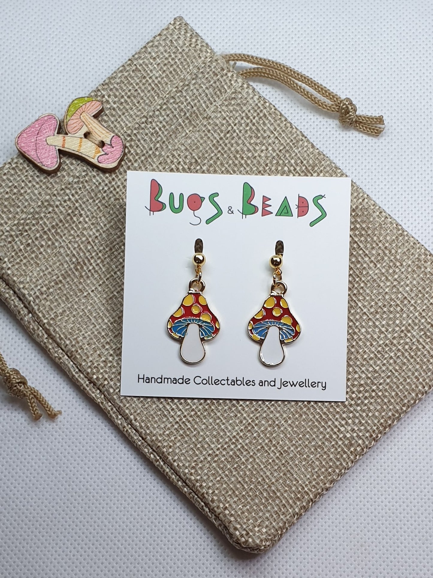 Amanita cartoon golden stud earrings