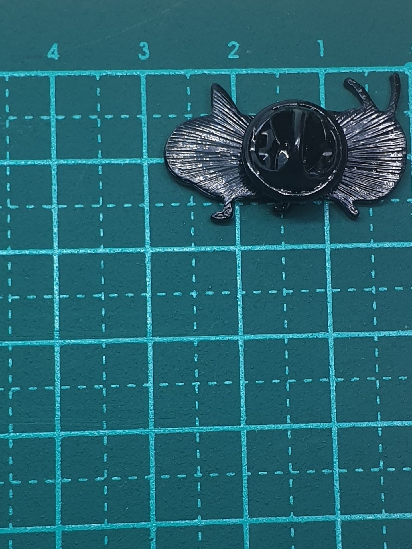 Grasshopper cartoon pin