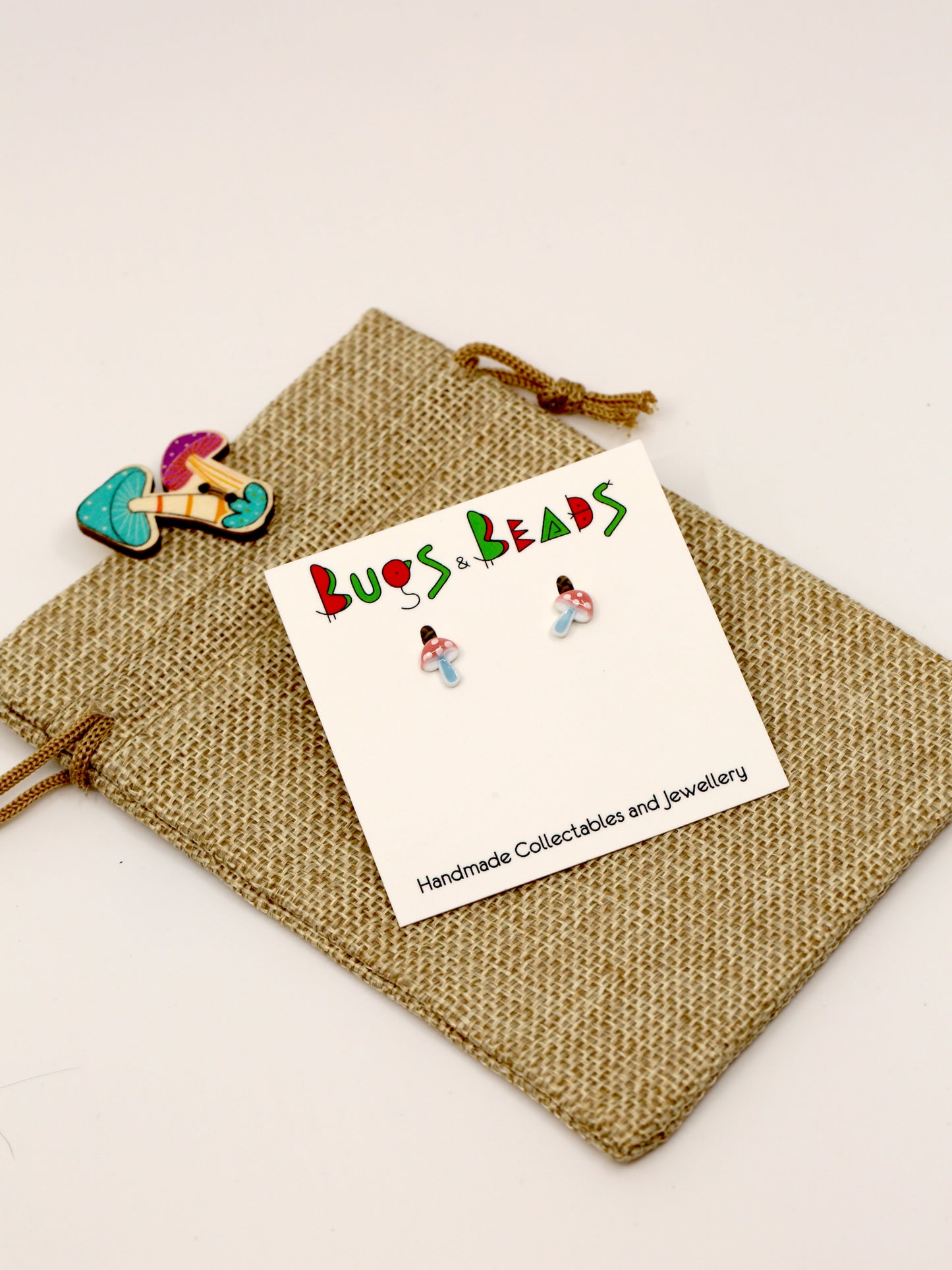 Tiny ceramic mushroom studs