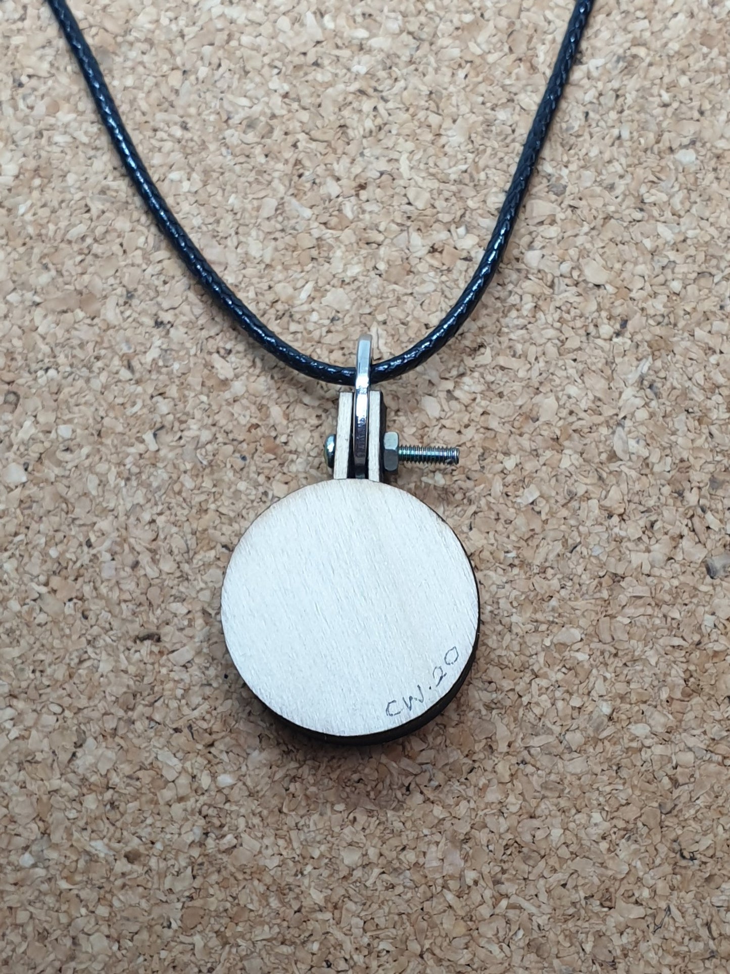 Stag Beetle silhouette hand embroidered pendant
