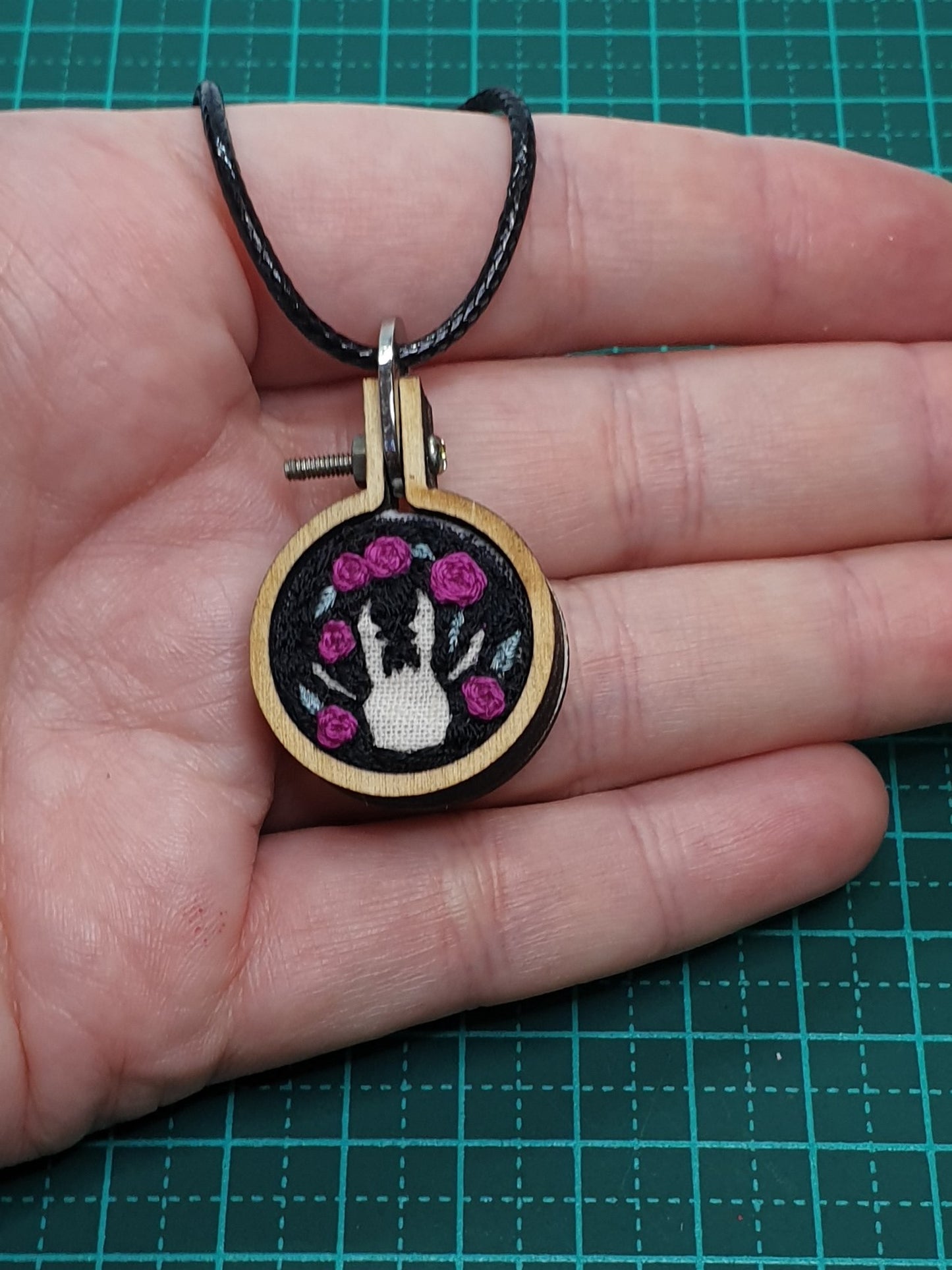 Stag Beetle silhouette hand embroidered pendant