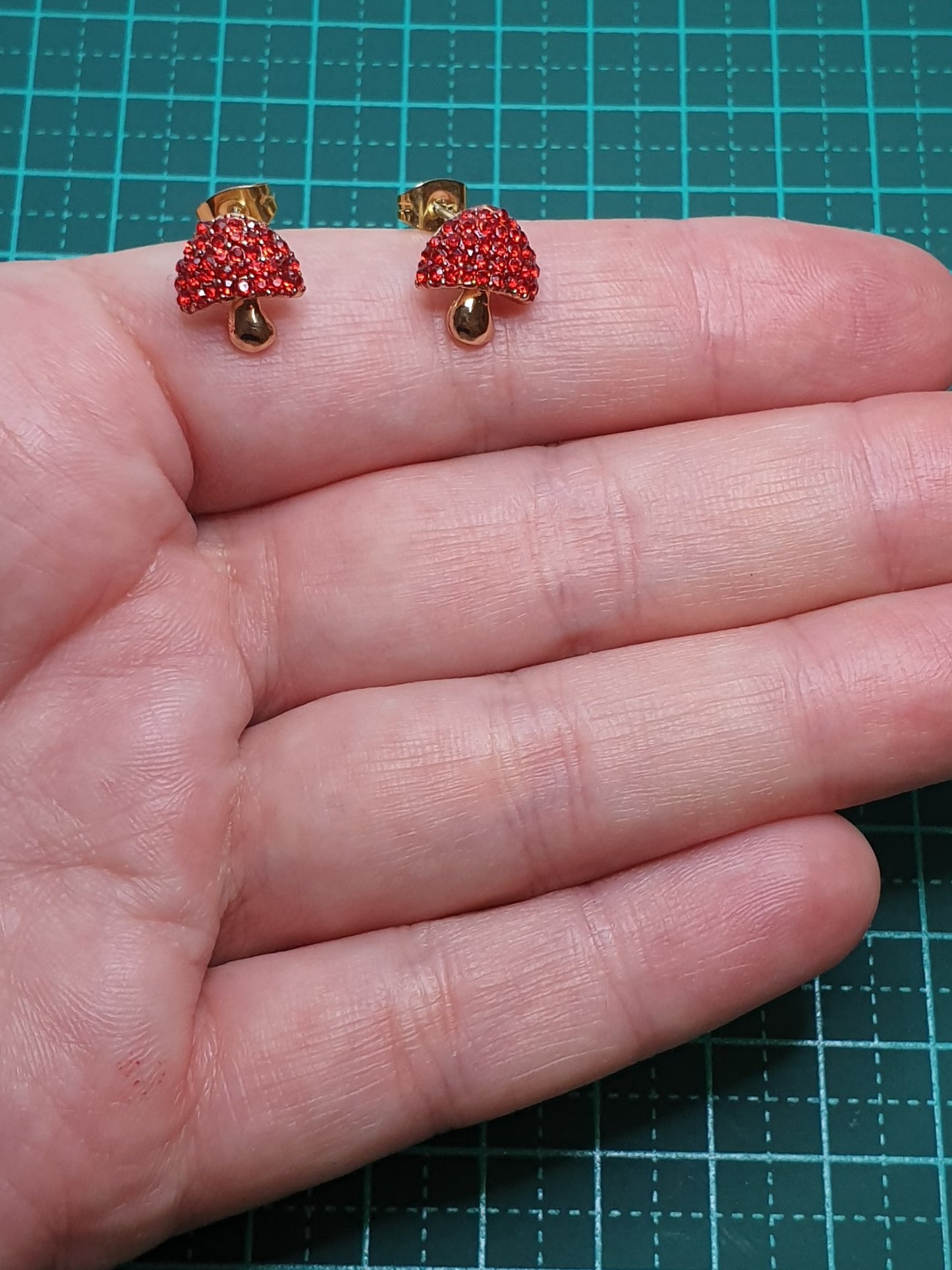 Red shiny mushroom stud earrings