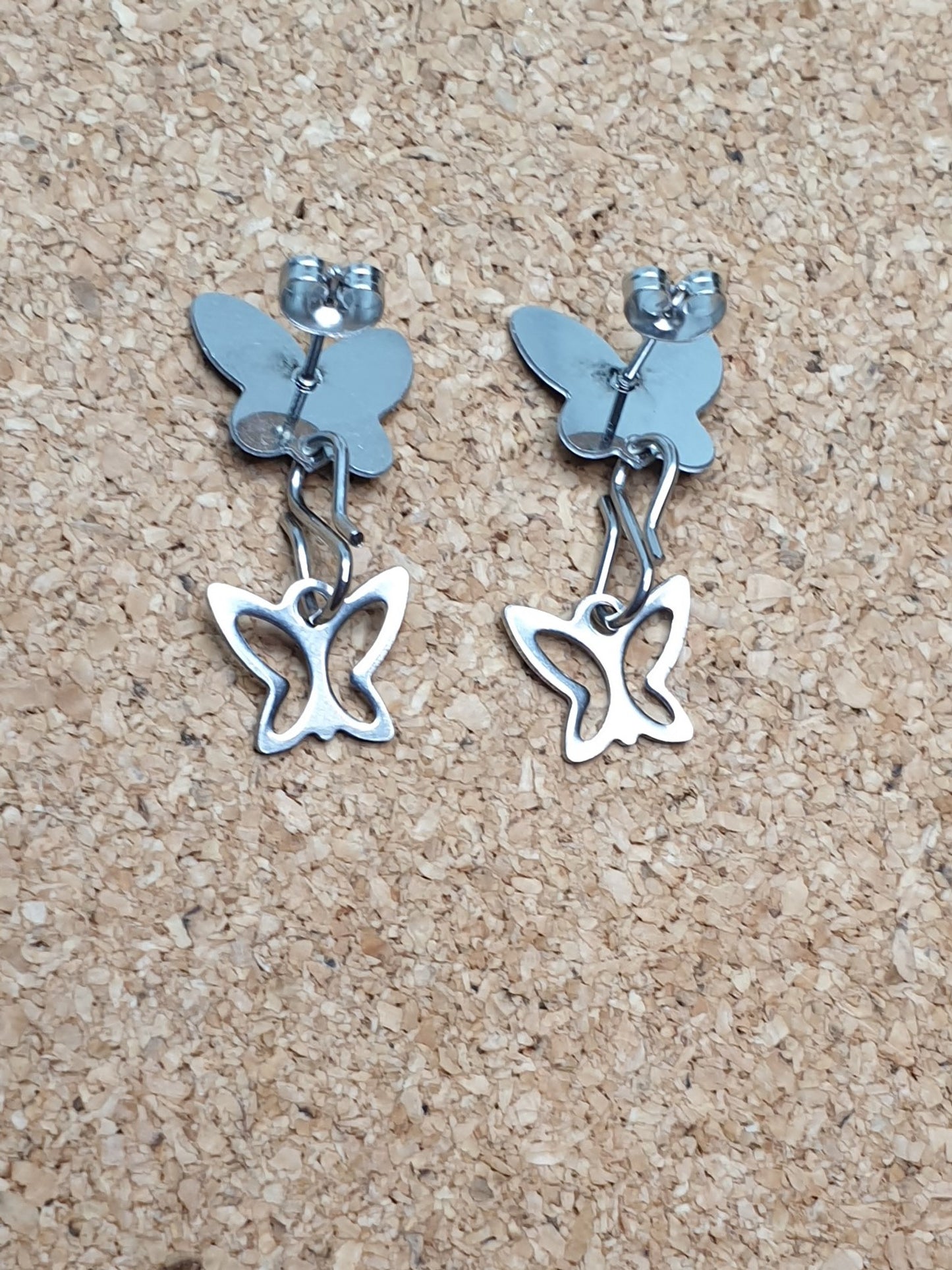 Black butterfly stud earrings