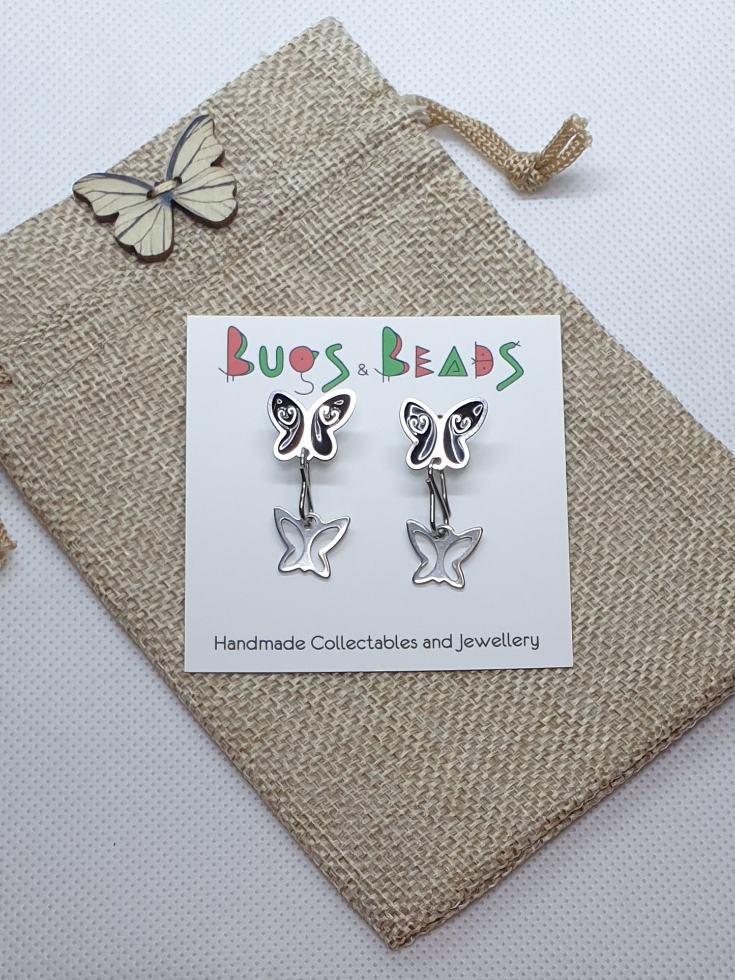 Black butterfly stud earrings