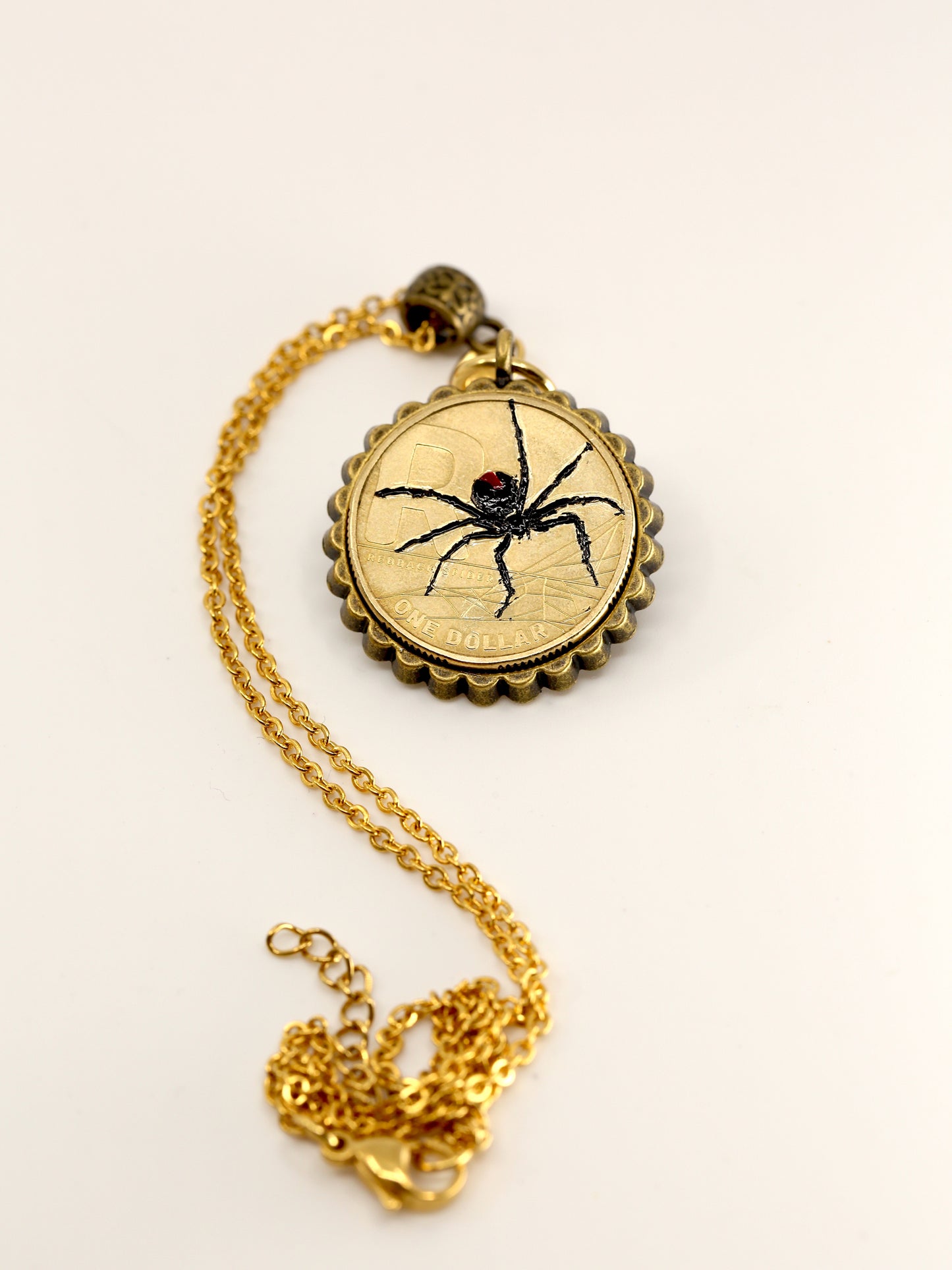 Red back spider decimal coin necklace