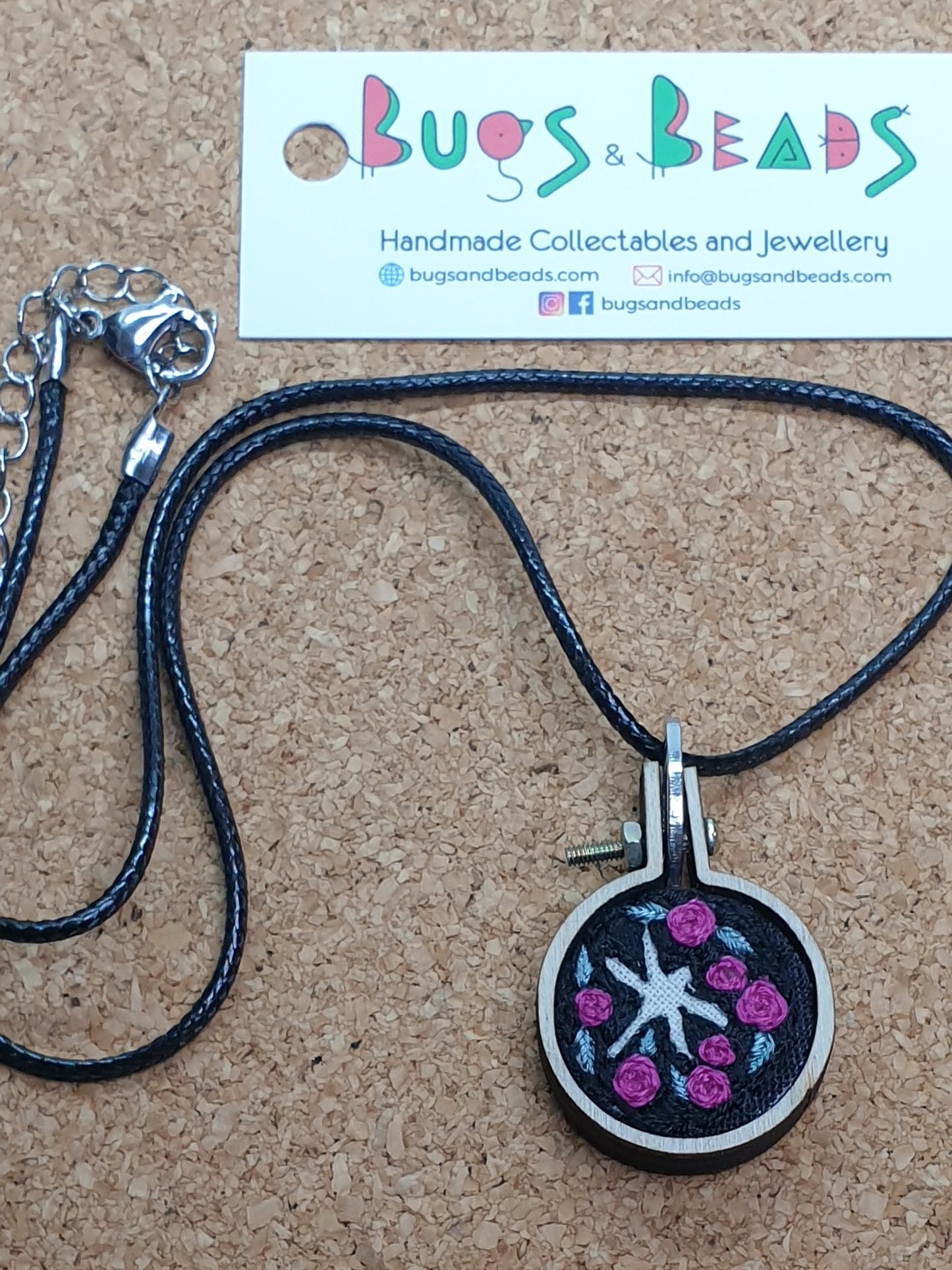 Dragonfly silhouette hand embroidered pendant