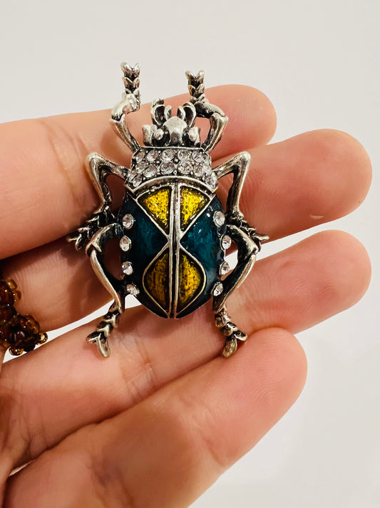 Prince beetle brooch