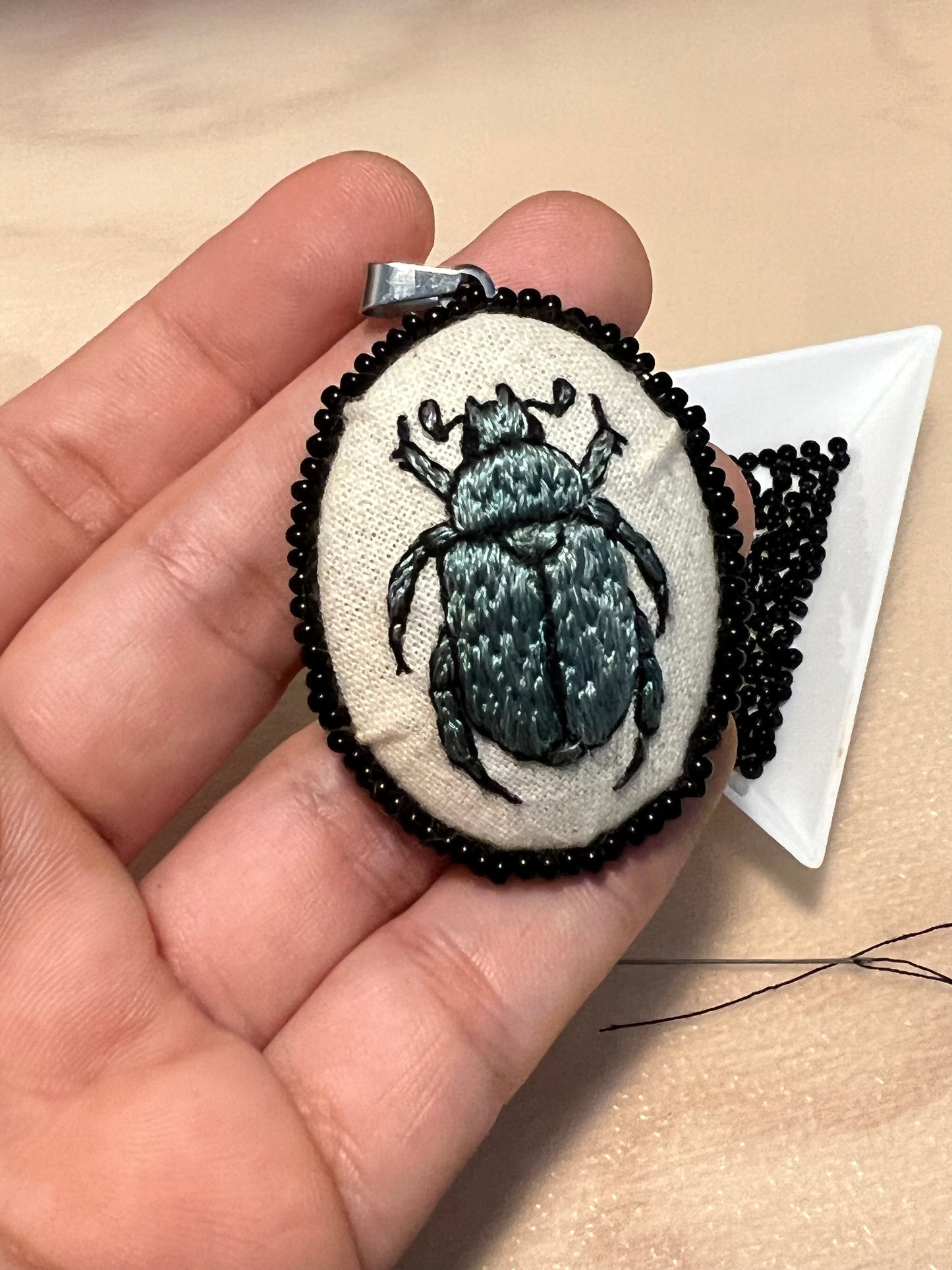 Green Christmas beetle embroidered necklace