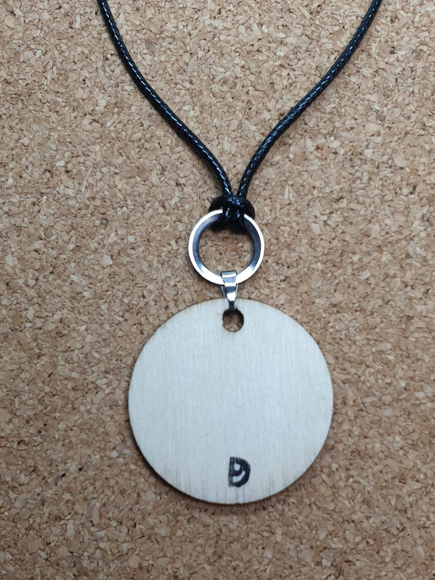 Sawtooth beetle hand printed wooden pendant