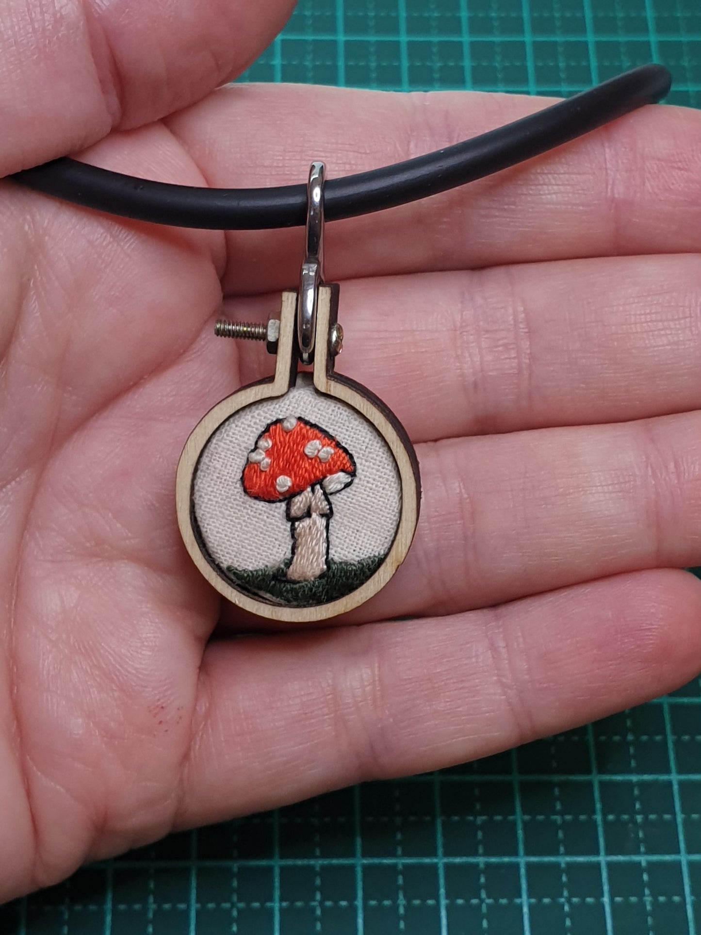 Amanita mushroom hand embroidered pendant