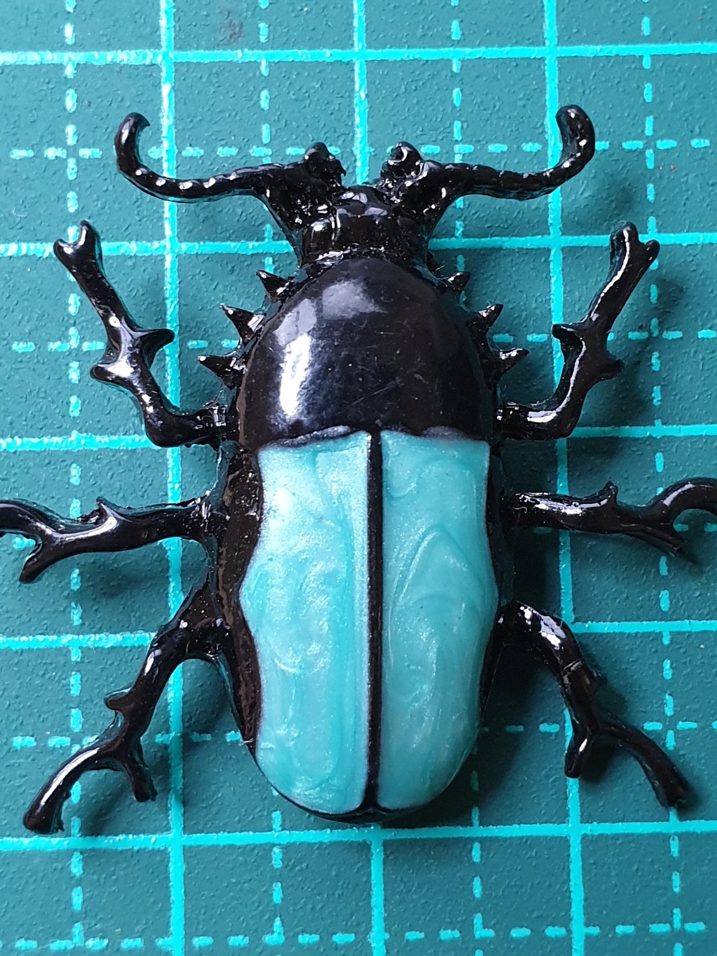 Spiny beetle brooch