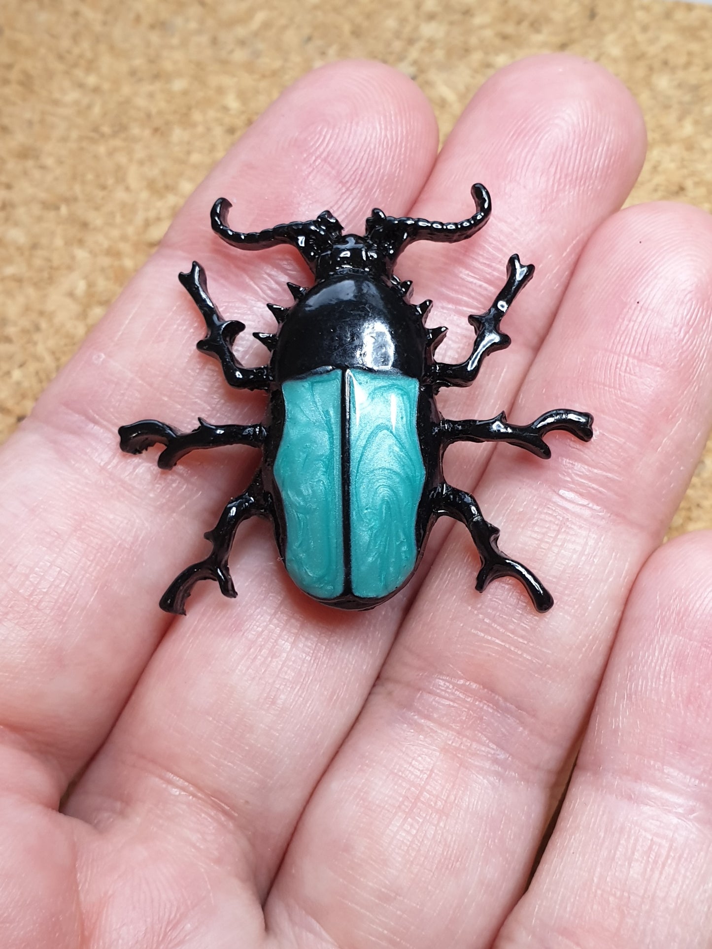 Spiny beetle brooch