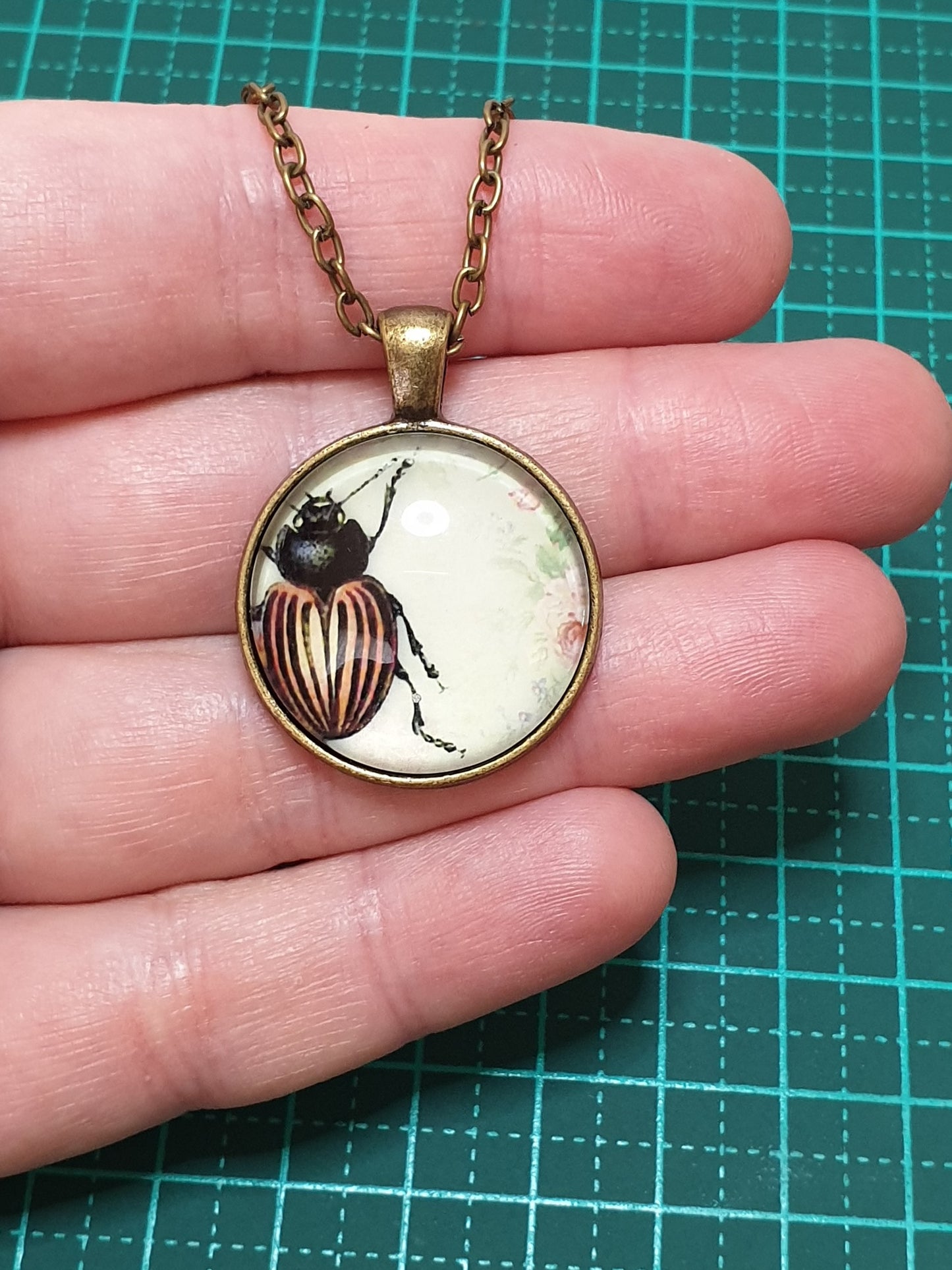 Orange & Black Beetle Necklace - Bronze