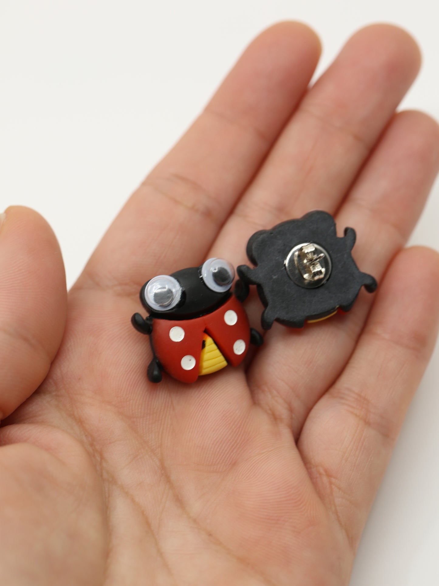 Googly ladybird stud earrings
