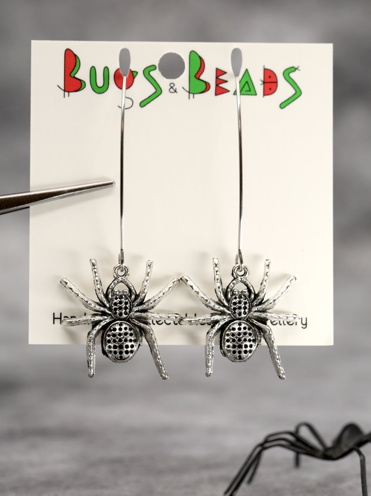 Dotted spider earrings