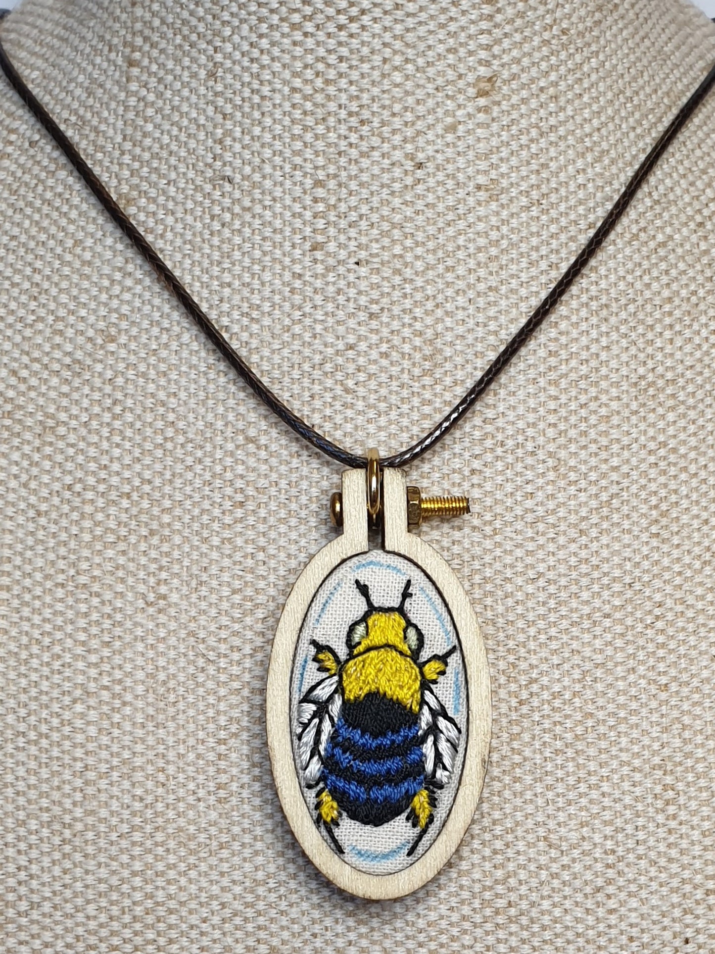 Blue Banded Bee hand embroidered pendant