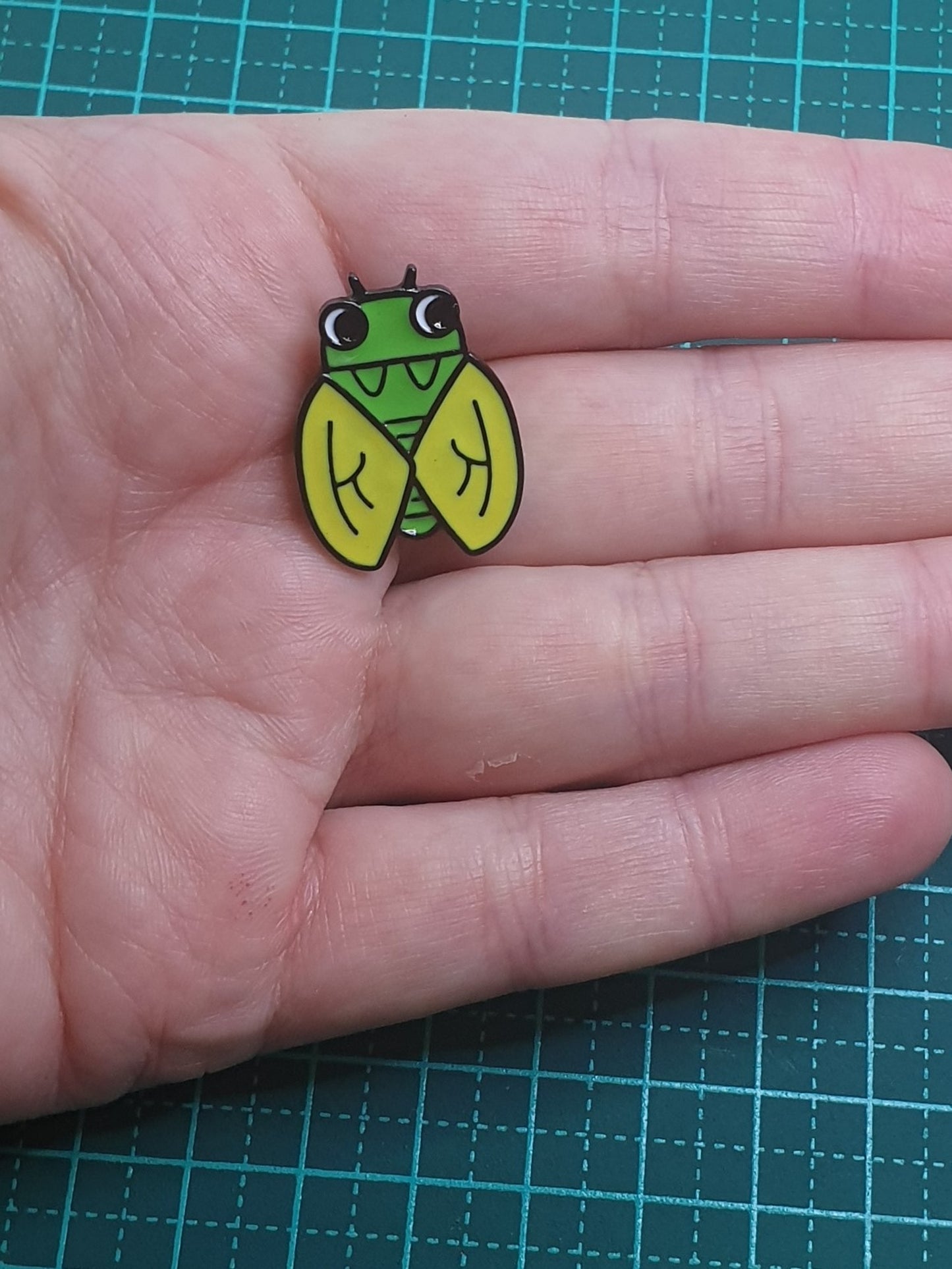 Cicada cartoon pin