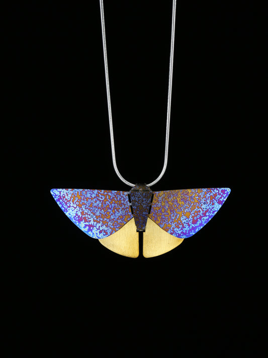 Titanium Moth pendant purple and gold