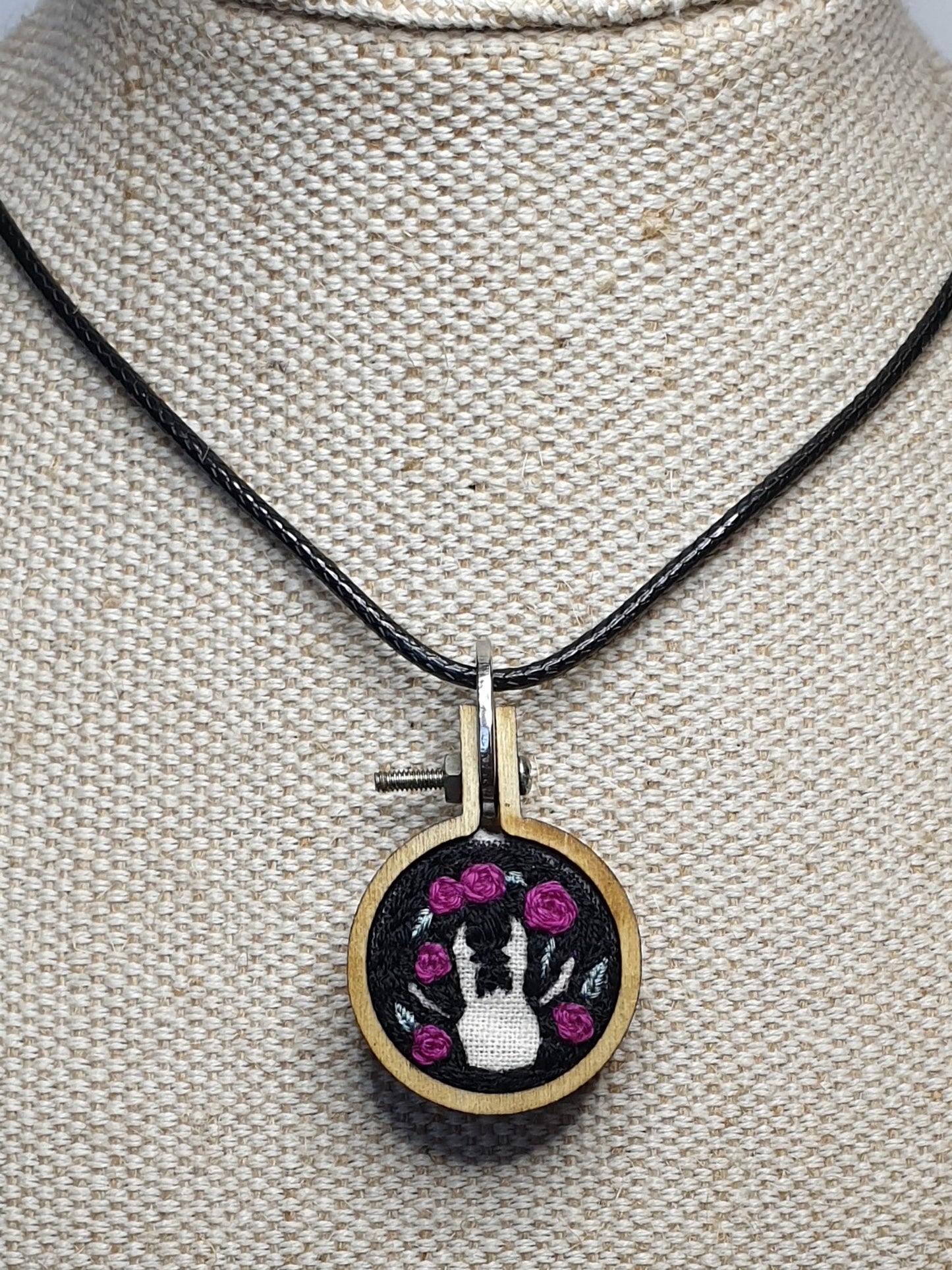 Stag Beetle silhouette hand embroidered pendant