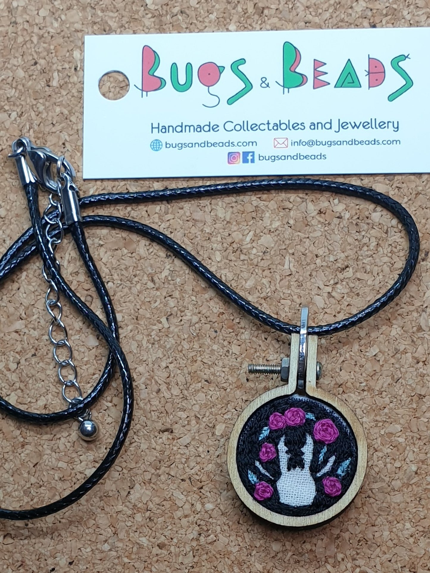 Stag Beetle silhouette hand embroidered pendant