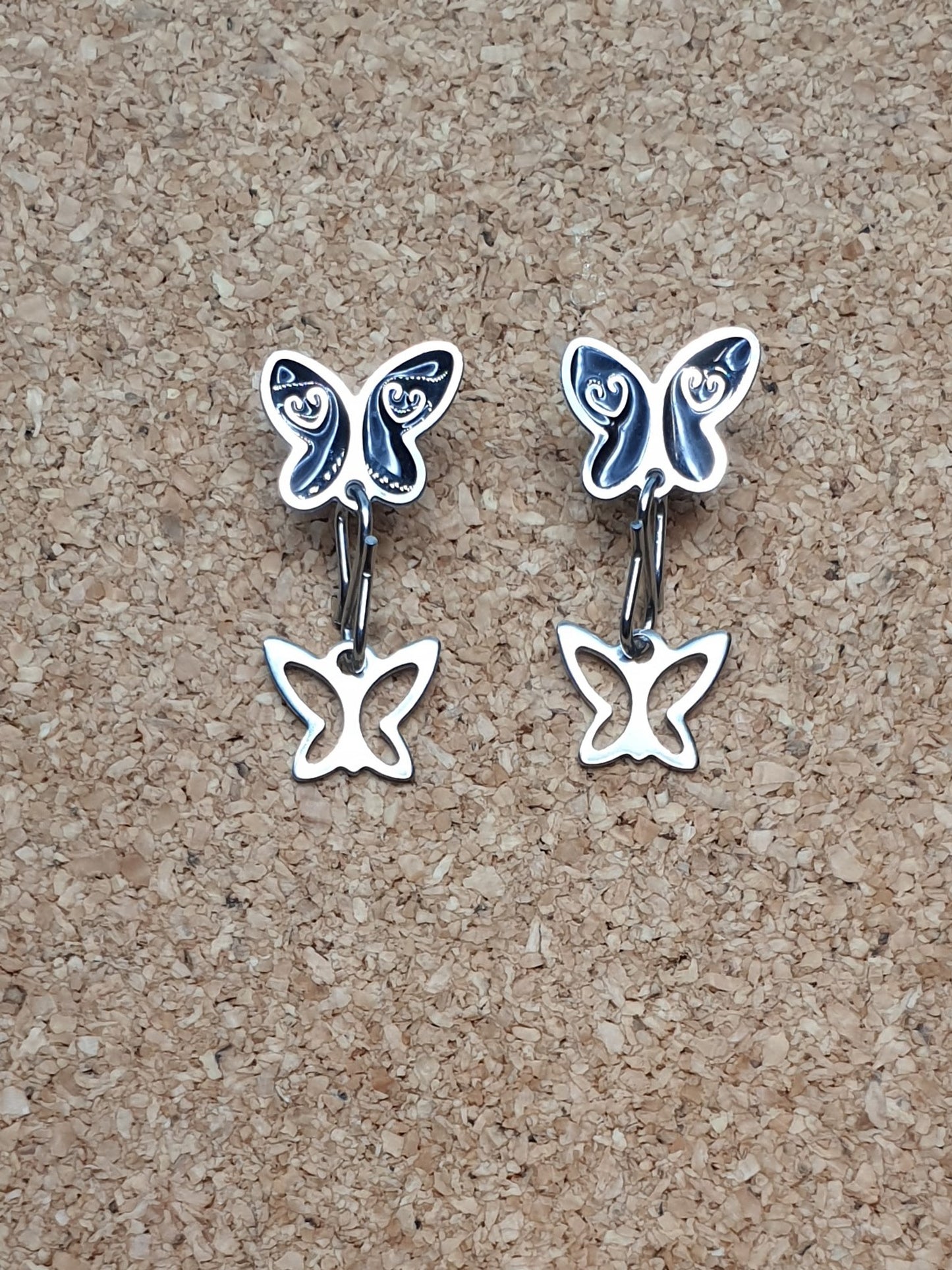 Black butterfly stud earrings