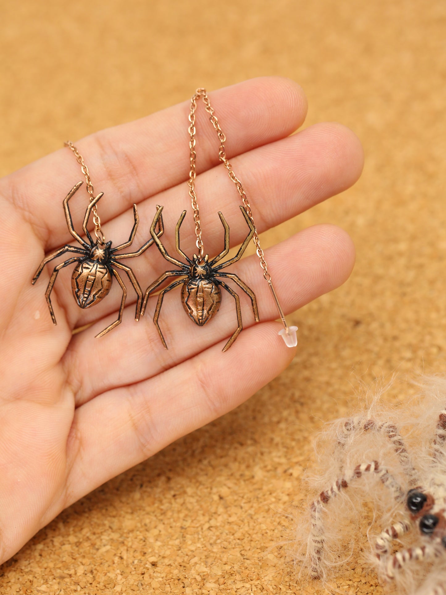Spider earrings on a thread