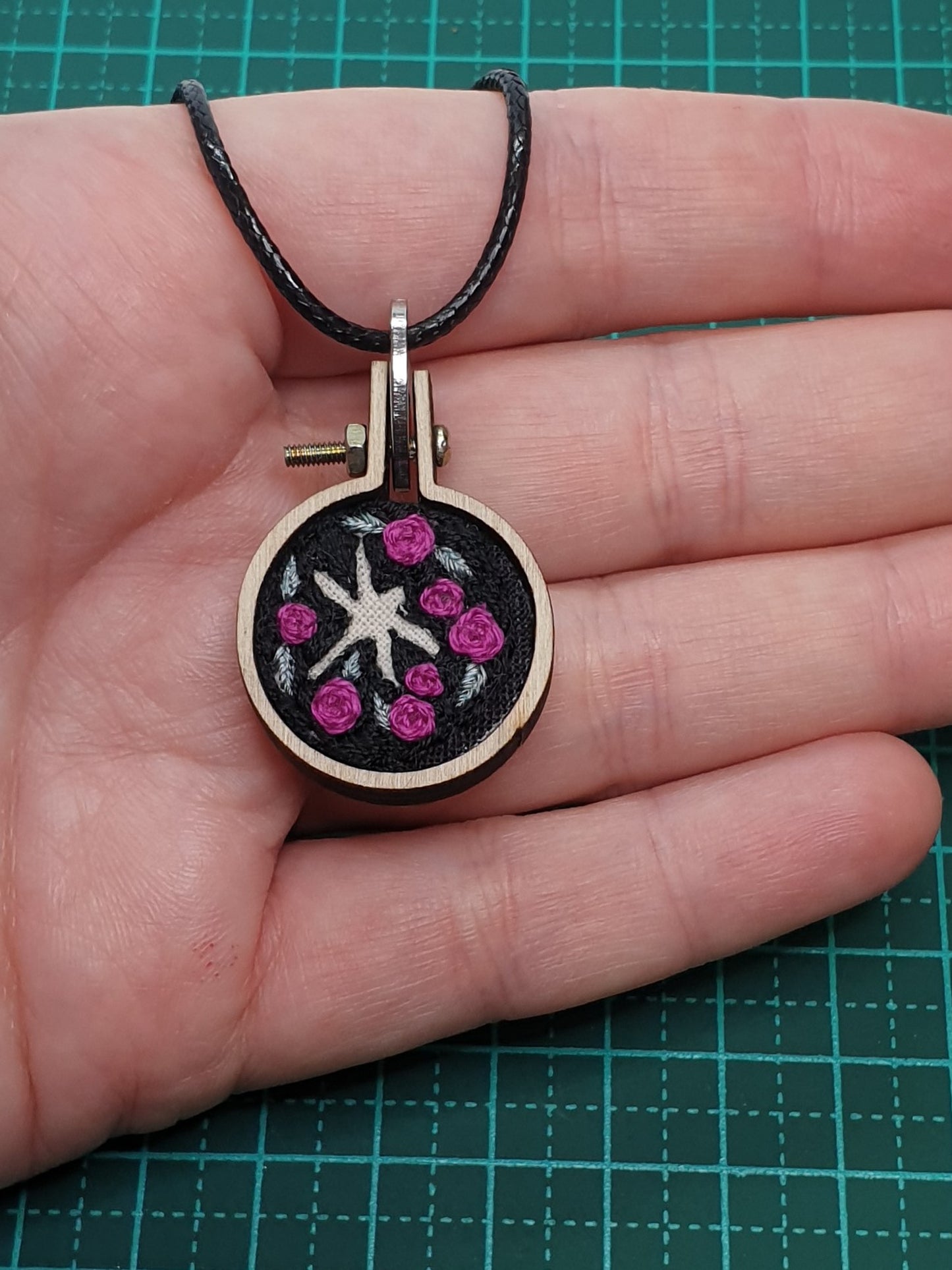 Dragonfly silhouette hand embroidered pendant